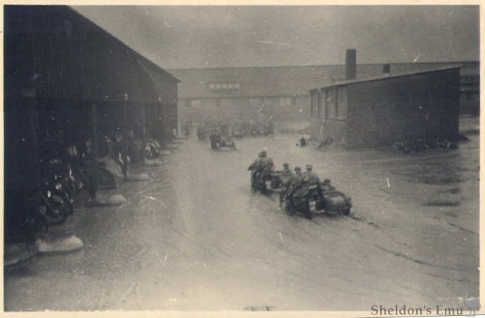 WWII-German-Motorcycle-Outfits-In-Flooded-Street.jpg